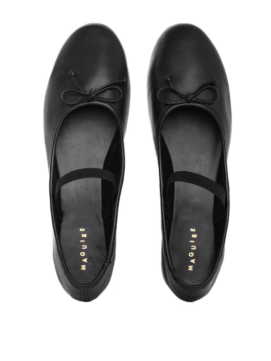 Black ballerina flats with bows