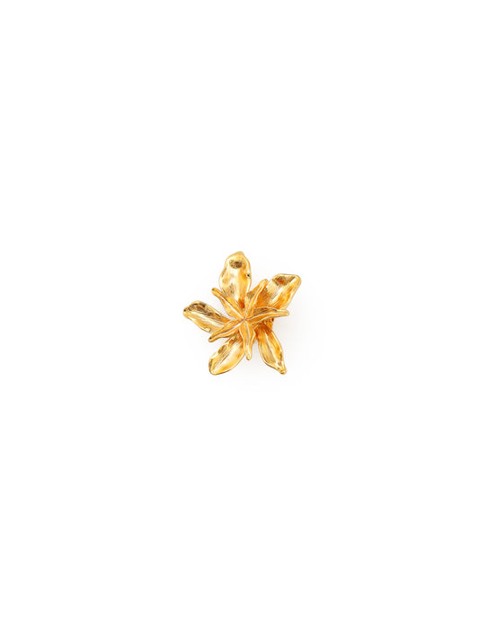 Gold flower clip.