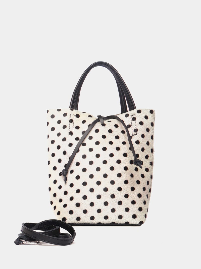 White polka dot pony hair mini leather tote bag with crossbody strap