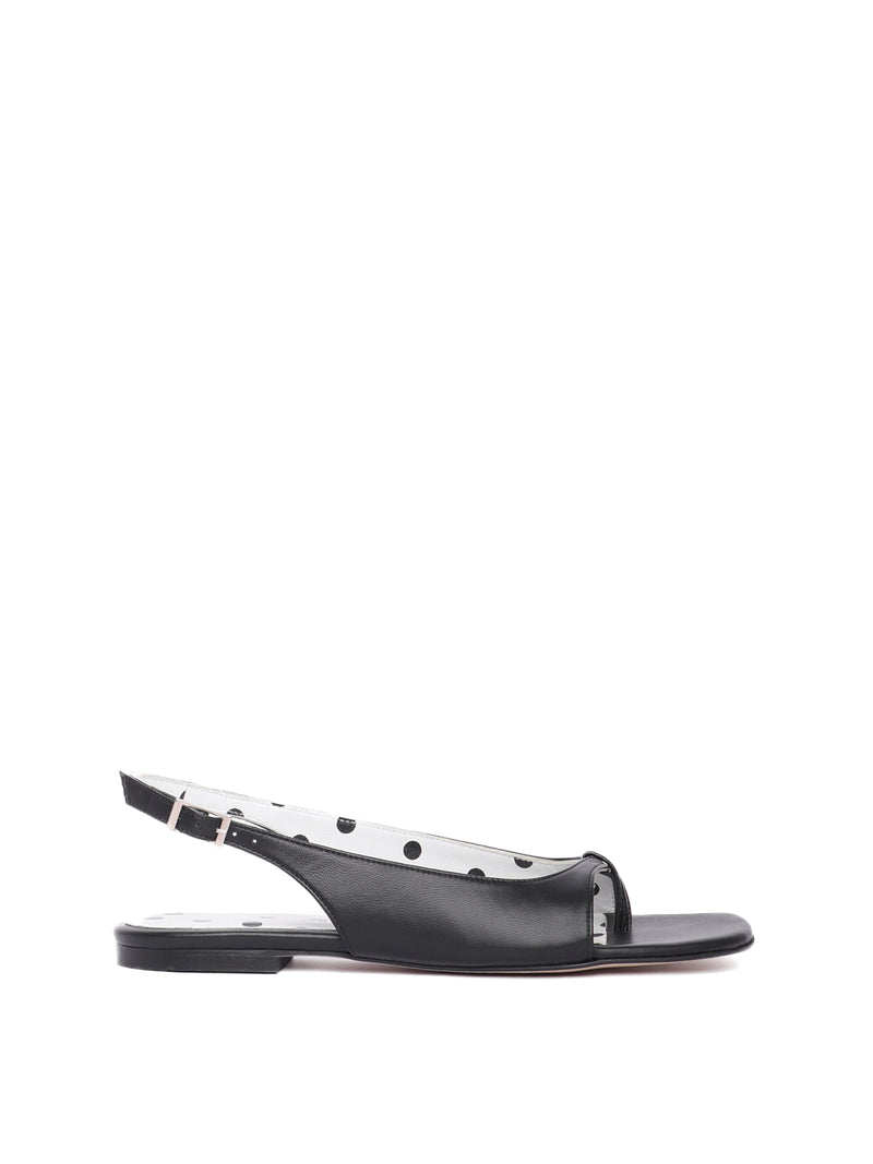Flat black sandal with white polka dot lining