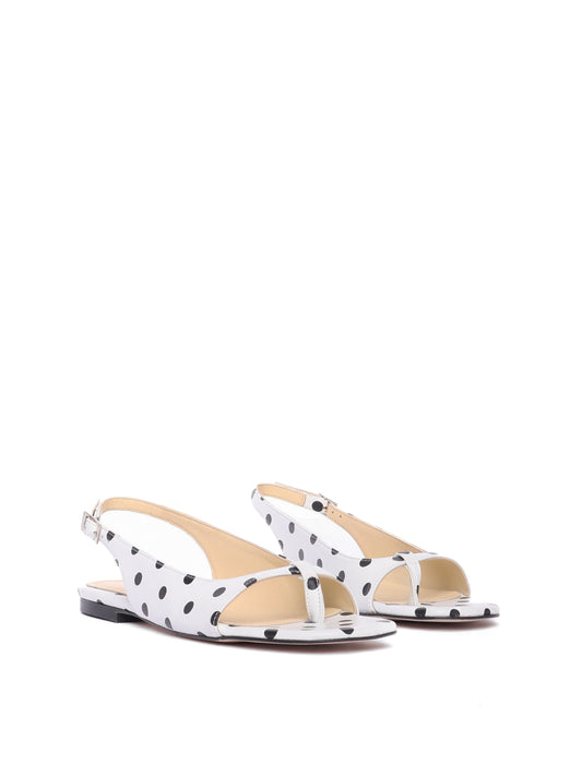 Flat slingback white polka dot sandals with beige lining