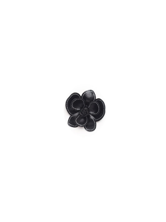 Black leather flower clip with white contrast stitching