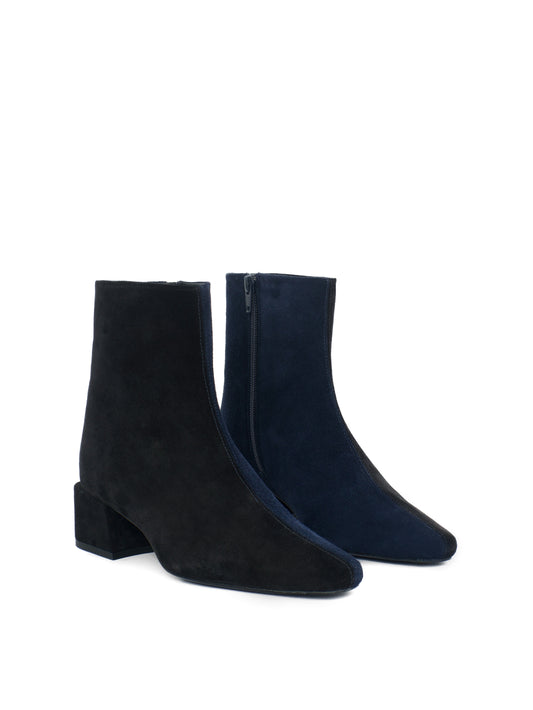 Black and navy suede heeled ankle boots with pointed toes