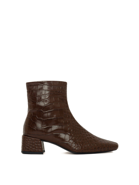Lisboa brown crocodile-pattern ankle boot with a heel, side view.