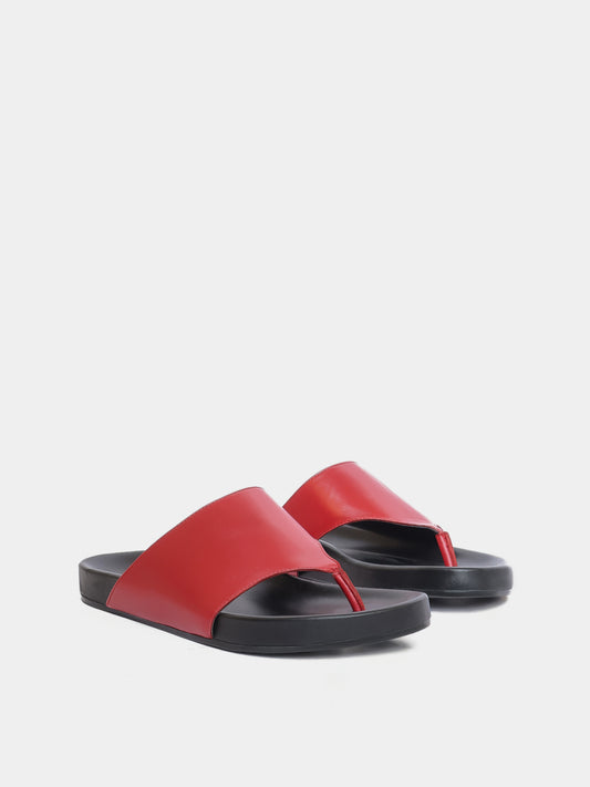 red flip flop sandal on grey background