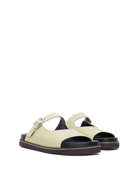 Pistachio sandals with adjustable buckle straps and flat soles.