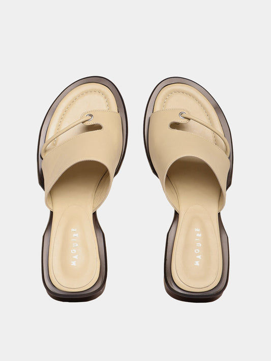 Beige leather sandals with a soft upper.