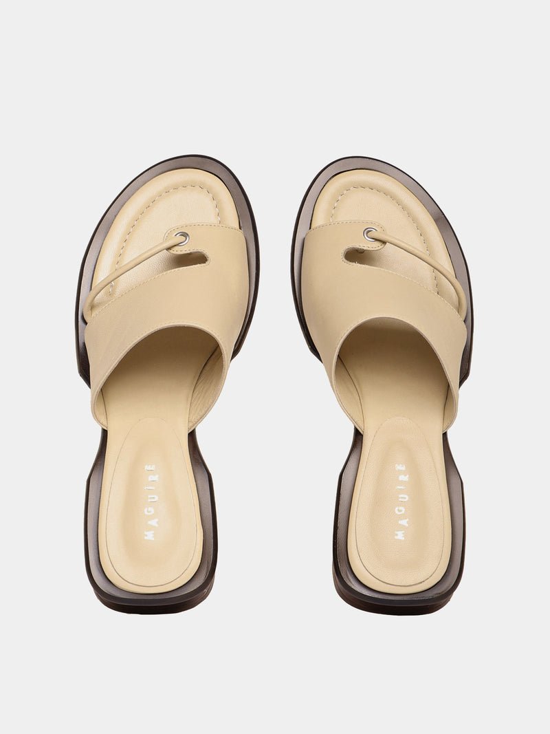 Beige leather sandals with a soft upper.