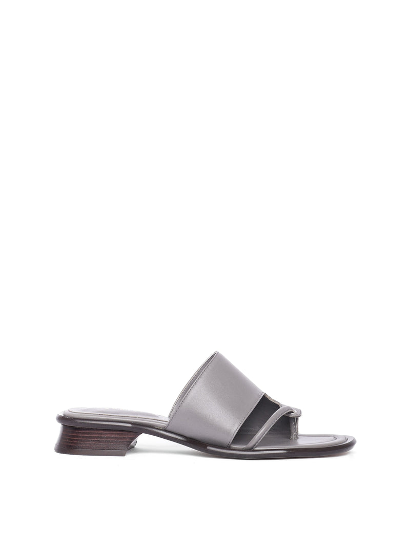 A gray Mallorca slate sandal with a low heel and soft upper, placed against a plain background.