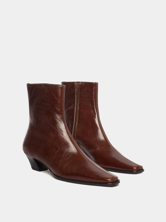 Brown leather ankle boots with a pointed toe