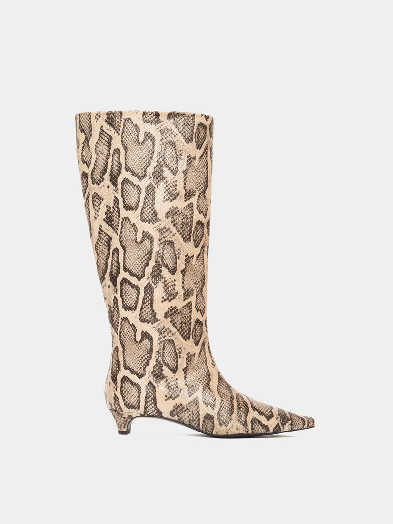 Knee-high snake pattern leather boots with a low heel and pointed toes