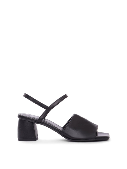 Black leather block heels with an ankle strap