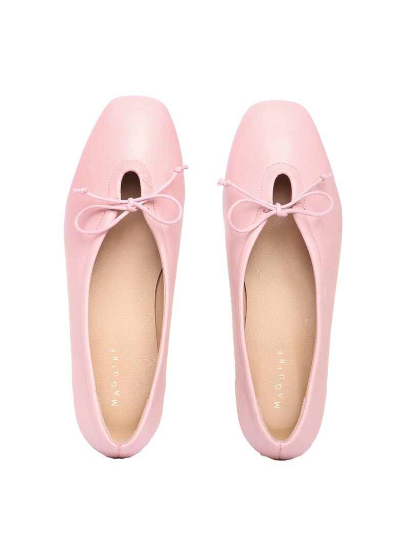 Blush pink leather ballerina flats with a blush pink bow