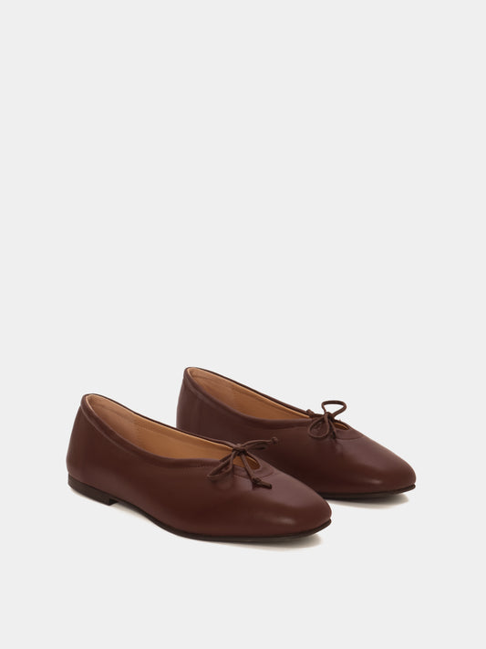 brown ballet flat with bows