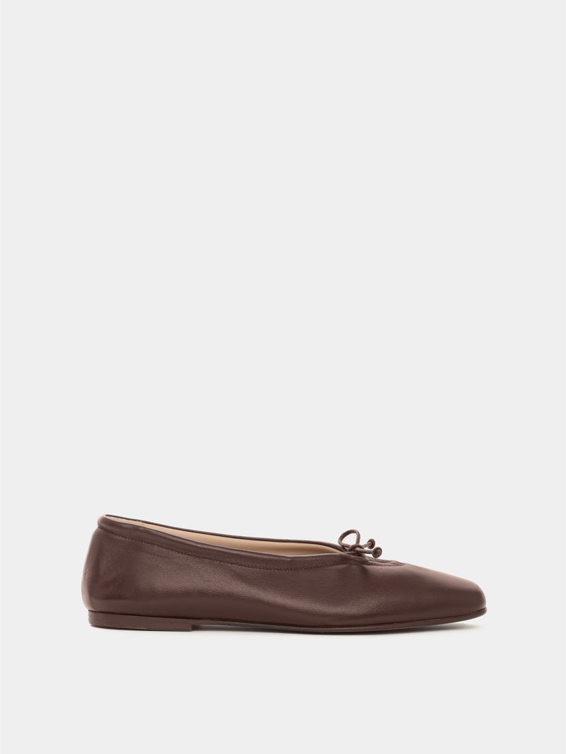 Brown leather ballerina flat with a brown bow