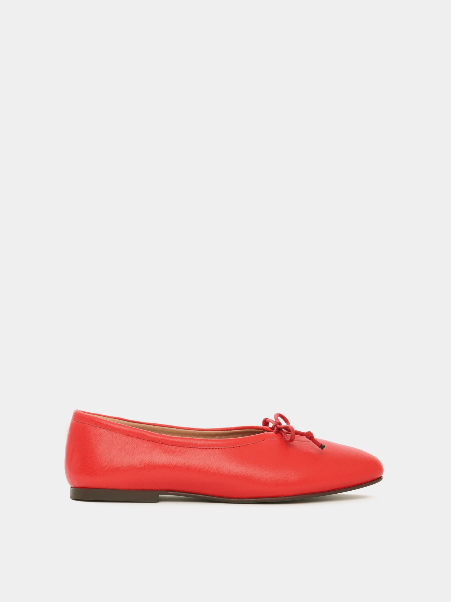 Lipstick leather ballerina flat with a red bow