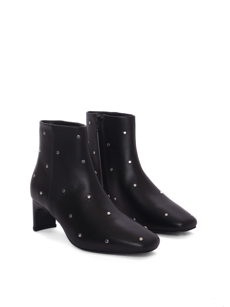 Black leather ankle boots with silver studs and a medium heel