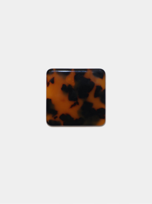 Ecom image of a square tortoise coloured shoe clip