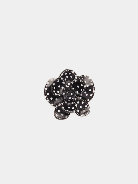 Black and white polka dot leather flower clip with white contrast stitching