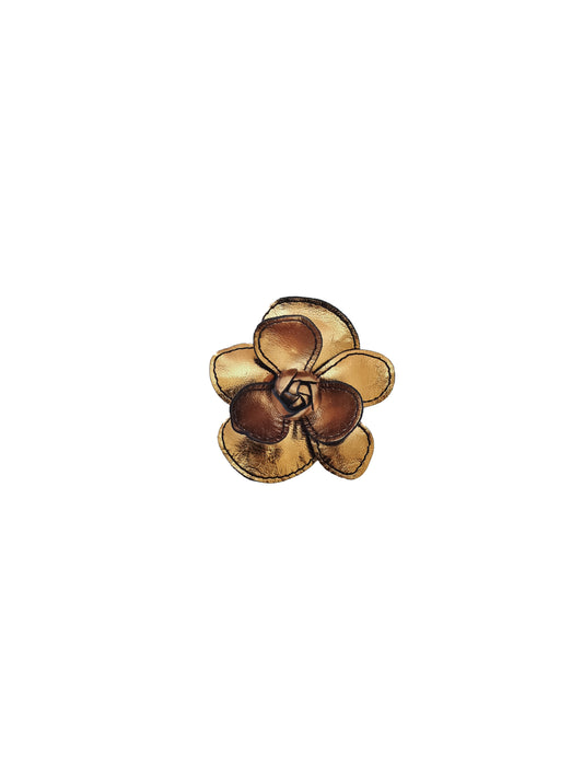 Bronze leather flower clip with black contrast stitching