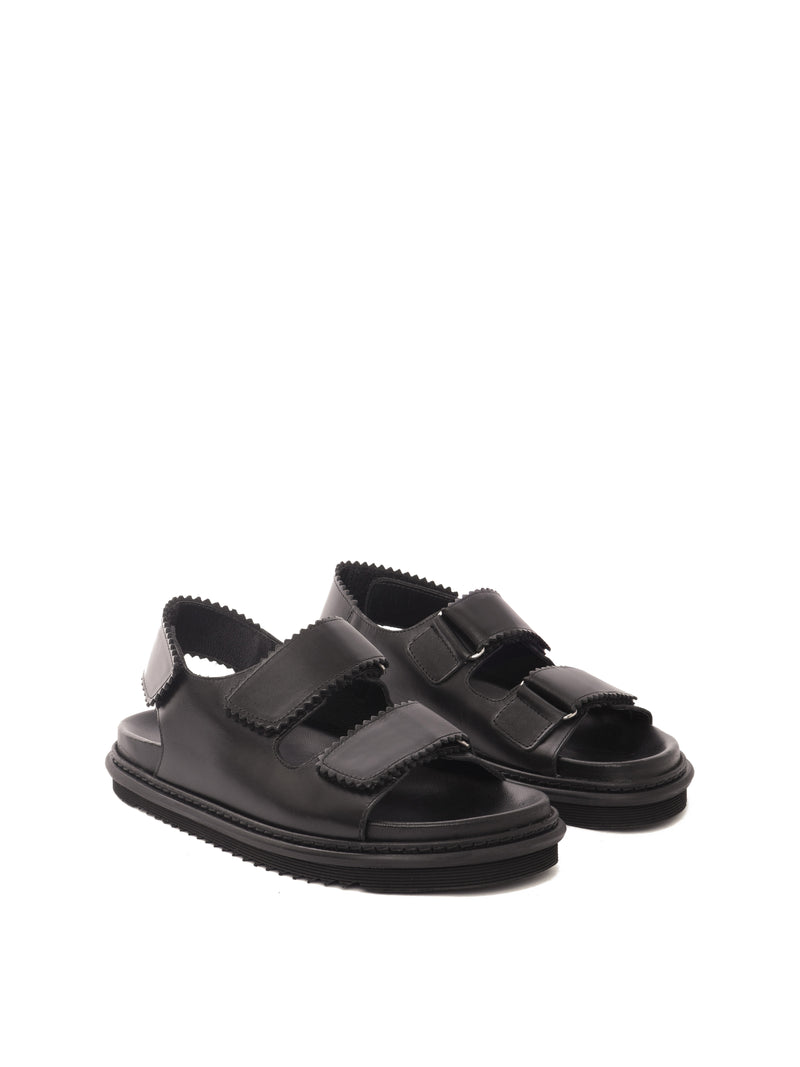 Tavira black leather sandal with two adjustable front straps and one back strap, front view.