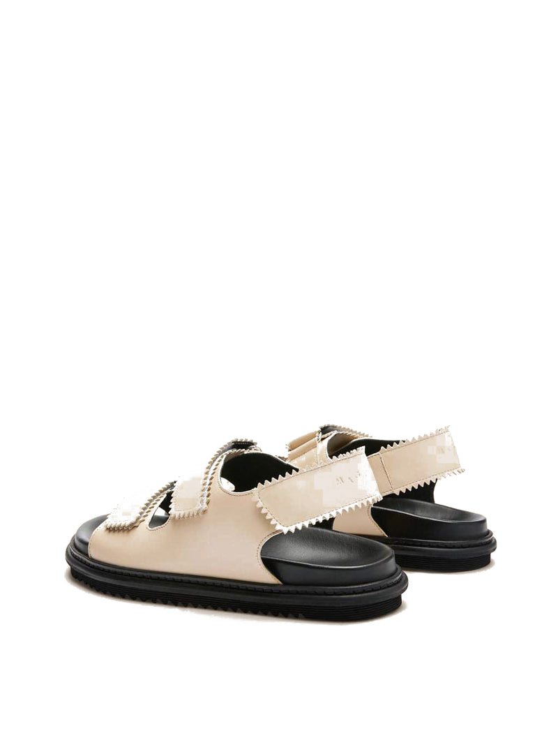 Tavira buttermilk leather sandal with two adjustable front straps and one back strap, back view.