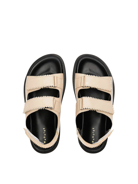 Tavira buttermilk leather sandal with two adjustable front straps and one back strap, top view.