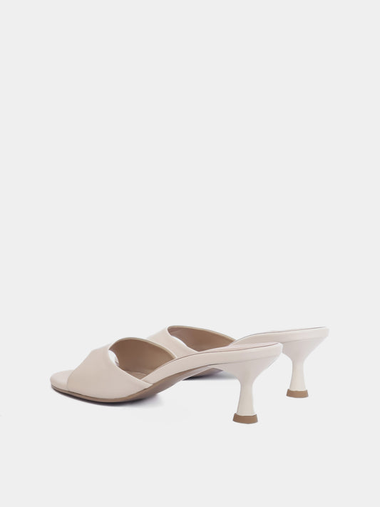 Back view of cream colored open toe heeled sandal on white background