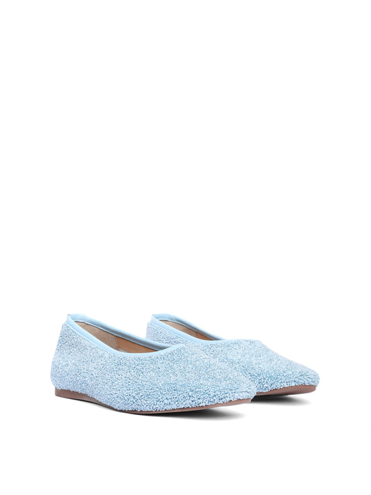 Ballerina flats made of blue raffia