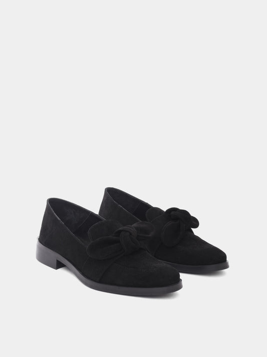 Black suede loafer with removable bow on upper