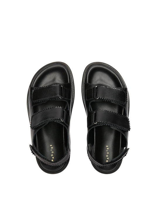 Tavira black leather sandal with two adjustable front straps and one back strap, top view.