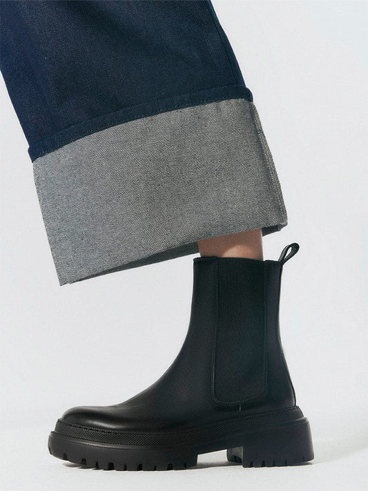 Black Chelsea Boot with a pair of jeans