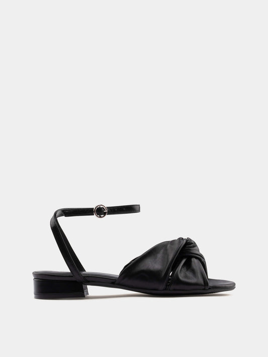 black sandal on gray background