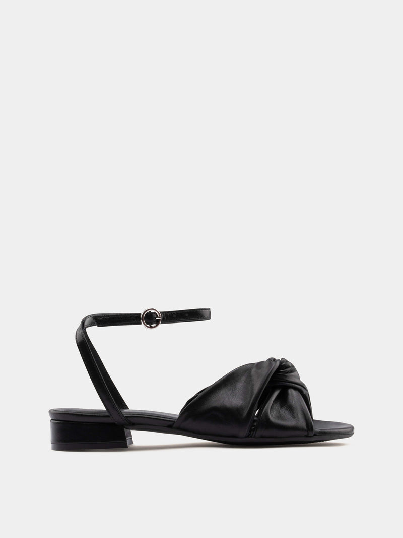black sandal on gray background