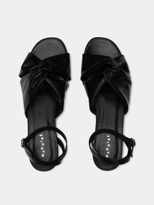 black sandal on gray background