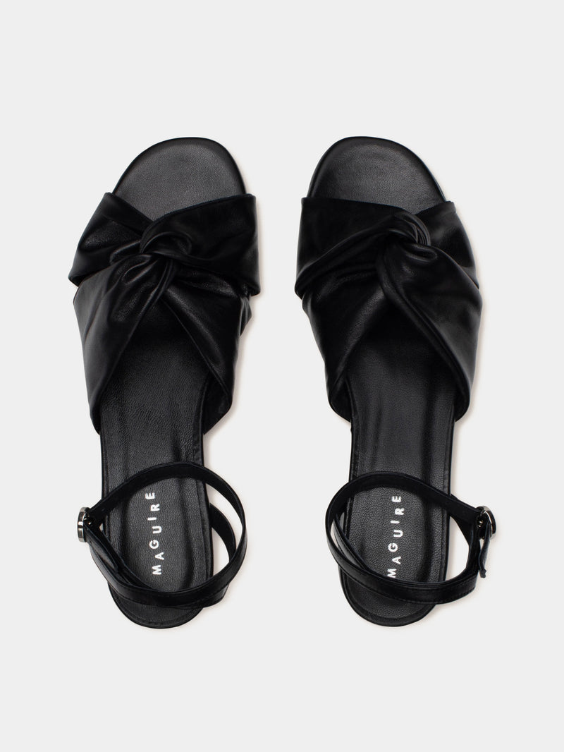 black sandal on gray background