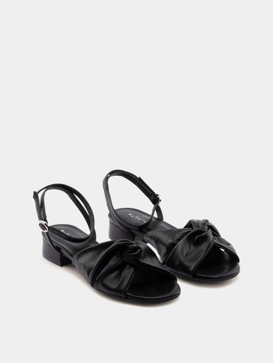 black sandal on gray background