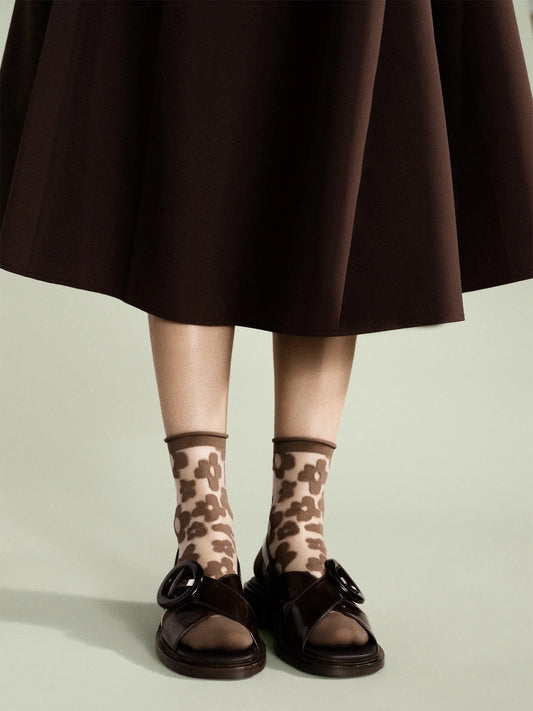 Brown Sheer Socks with flower with a brown skirt