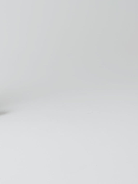 Video of loafer with a puffy suede bow detail on the vamp, in a black leather. 